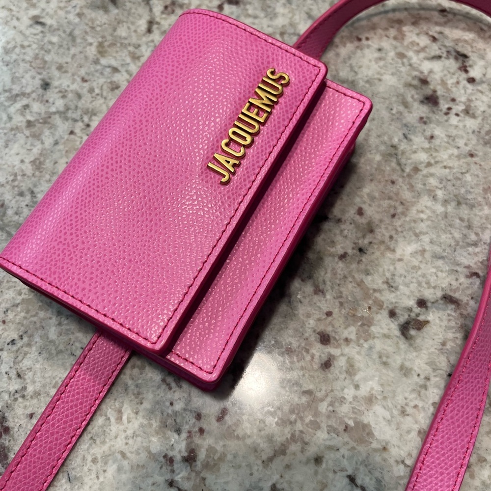 LIKE NEW pink jacquemus wallet belt.